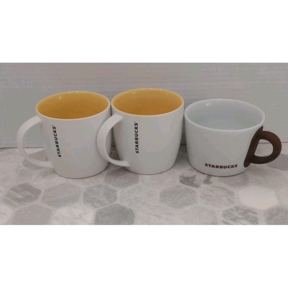STARBUCKS Kahla brown Handle Cup Mug and 2 Yellow Inside Cup Mugs Lot of 3